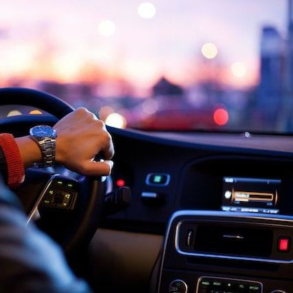 a man driving his car